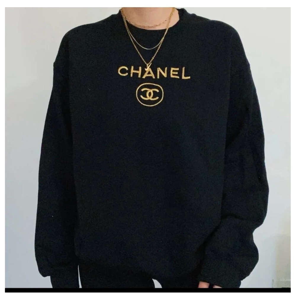 CHANEL Black Crew Neck Sweater Luxurious Knit Gold Logo
